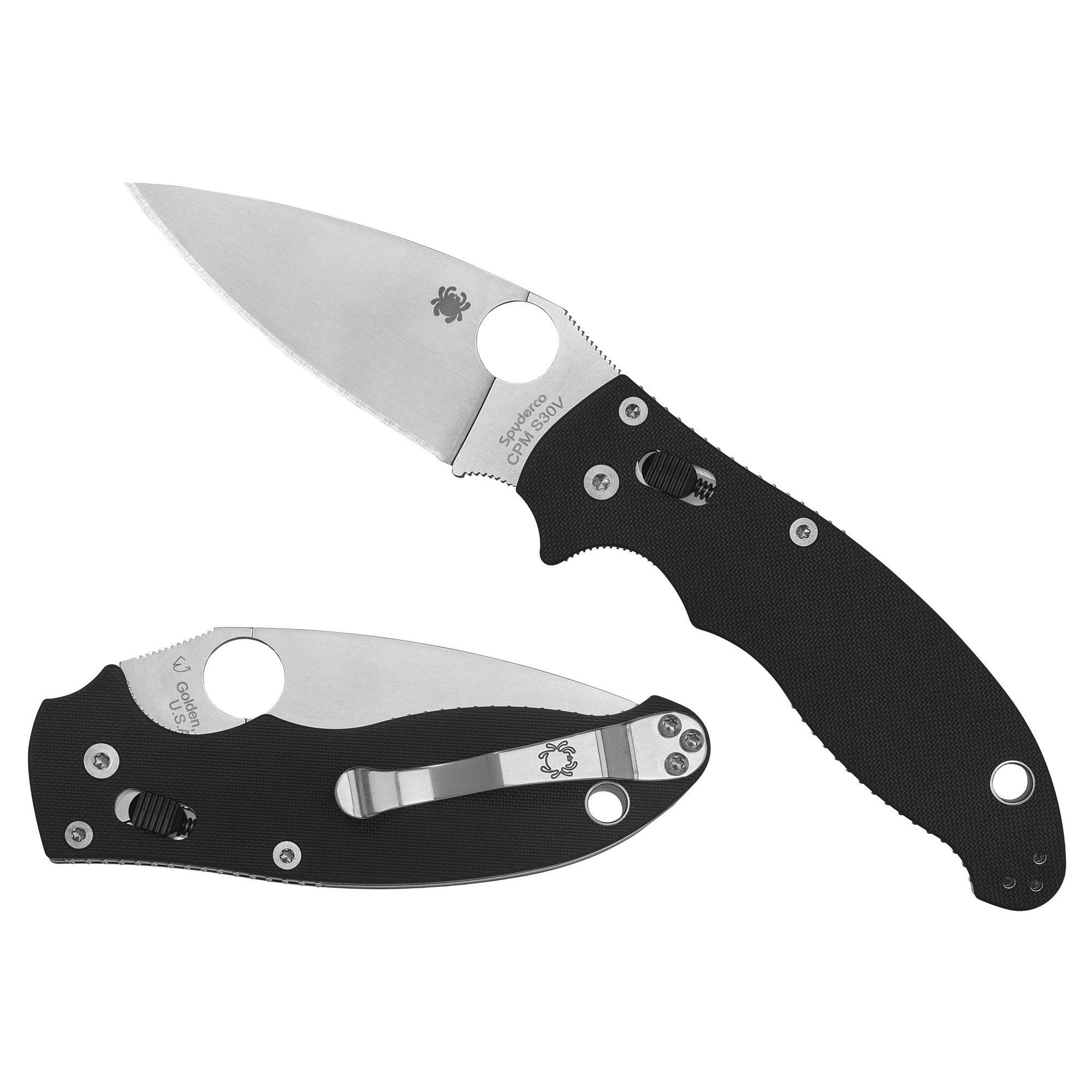 Spyderco Manix 2 folding knife with a black G10 handle and a plain edge CPM-S30V blade, shown open on a rustic surface.